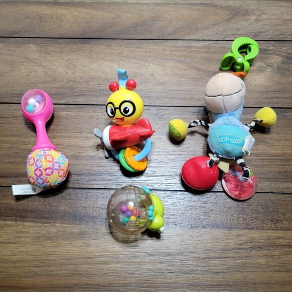 Set of 4 Infant Toys: Noise Makers-Pink Rattle, Airplane, Gecko Ball & Clip Clop - Picture 1 of 9